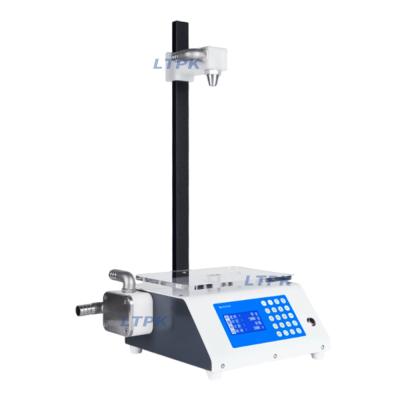 LTPK 5-Y Particle containing liquid weighing and filling machine